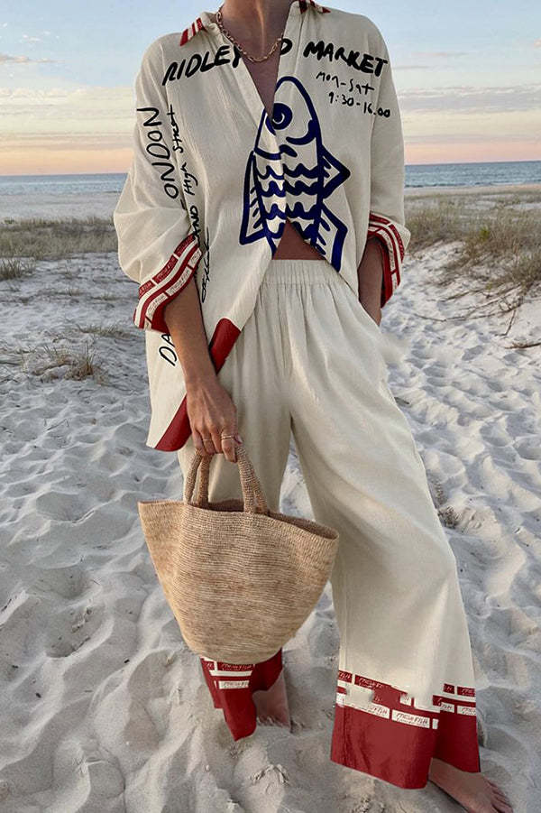 Rounelle™ - Linen suit with blue fish print
