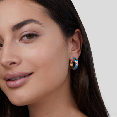 Gold circle earrings with flower design