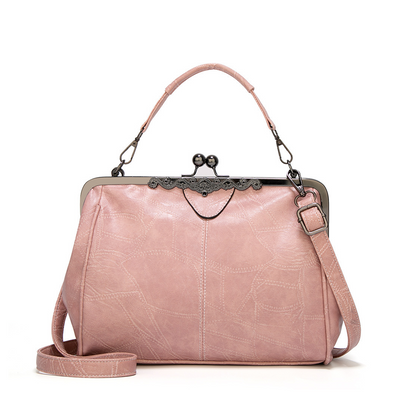 Vintage kiss lock handbag